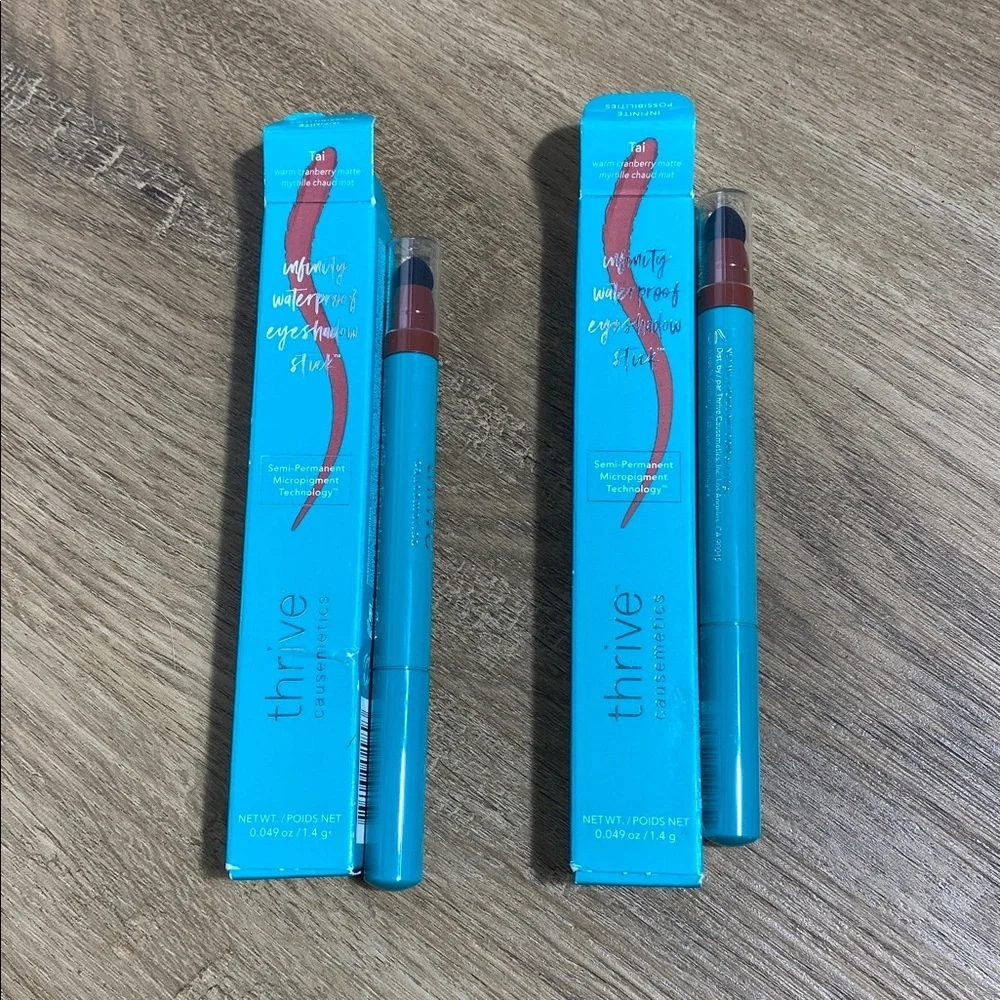 2 Thrive Causemetics Eyeshadow Sticks in Tai warm cranberry matte